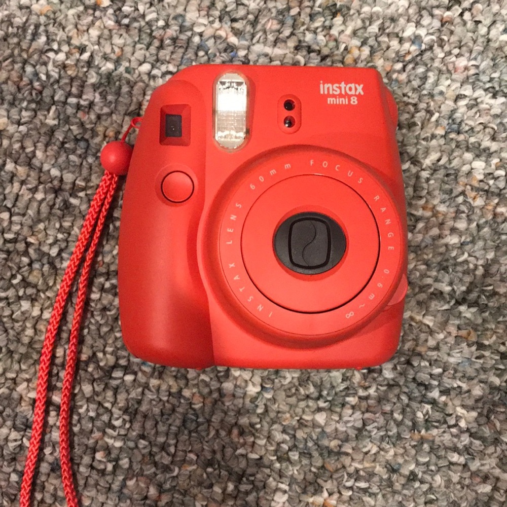 Instax Polaroid camera, pink.